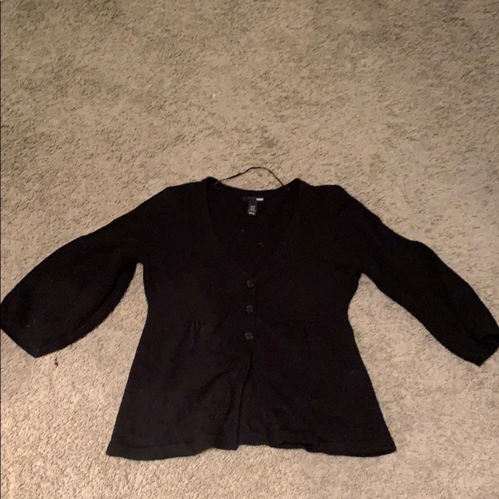 V neck black sweater.